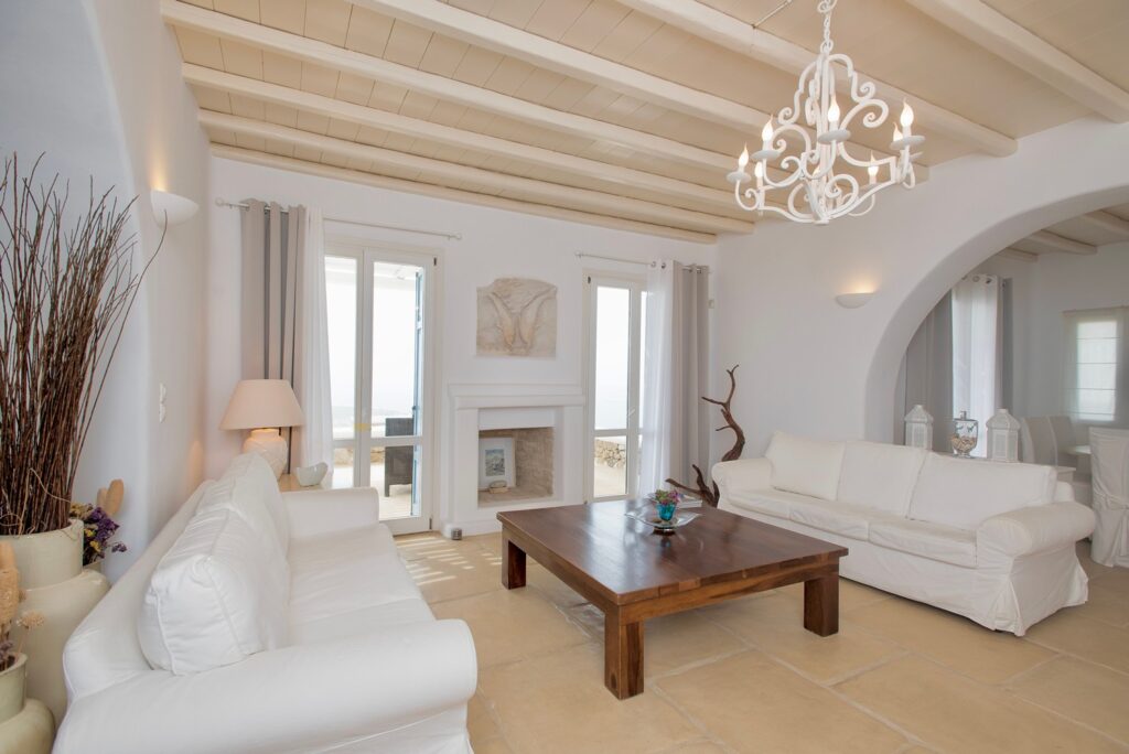 White and cream design in the living room of a splendid Mykonos villa for rent.