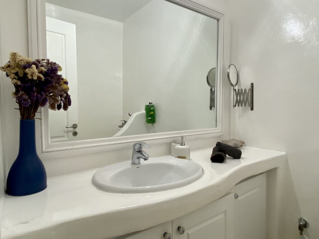 Nice bathroom details and modern sink in the lavish villa for rent, Mykonos.