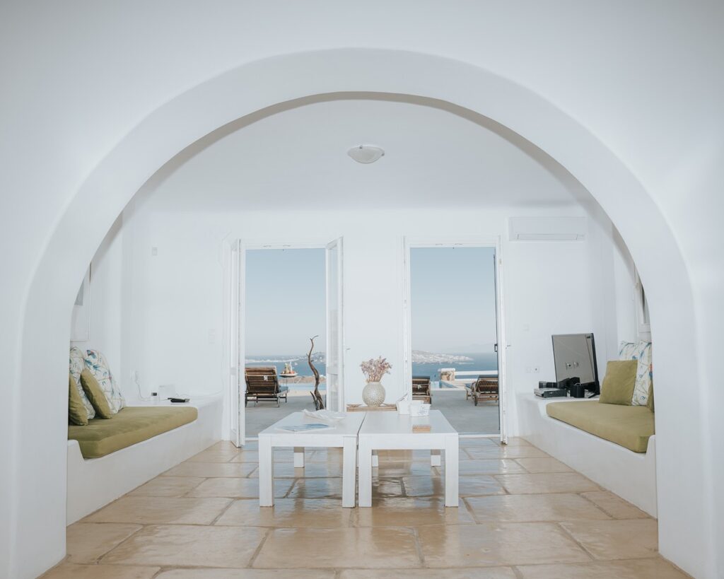 Comfortable living room with a perfect sea view in Mykonos' best rental home.