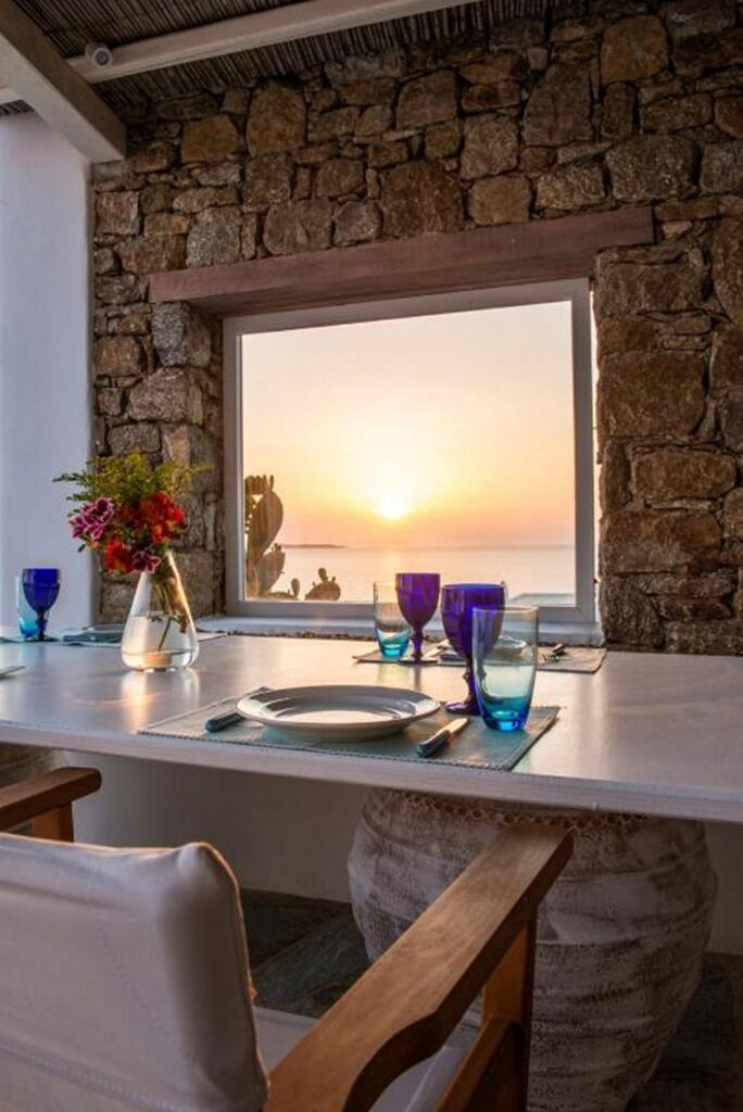 Sunset and sea view from the luxurious Mykonos villa for rent.