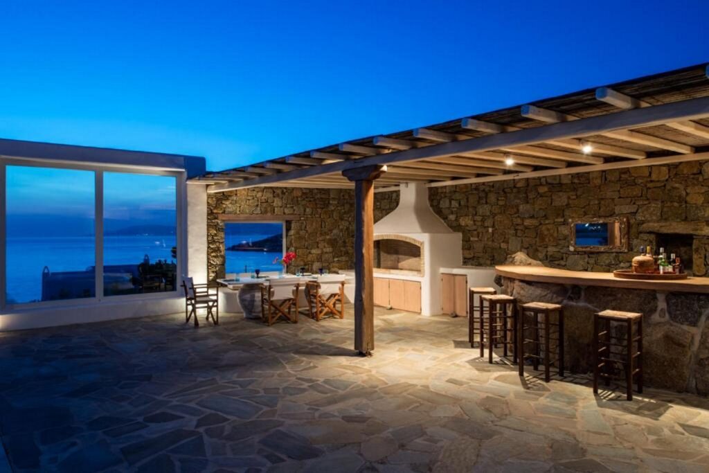 Bar and chill-put area outside of top rental villa in Mykonos, Greece.