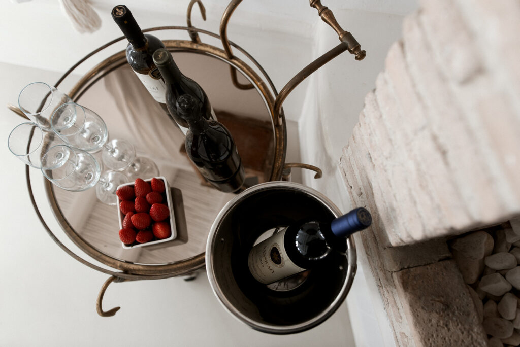 Wine and strawberries in Mykonos lavish villa for rent.