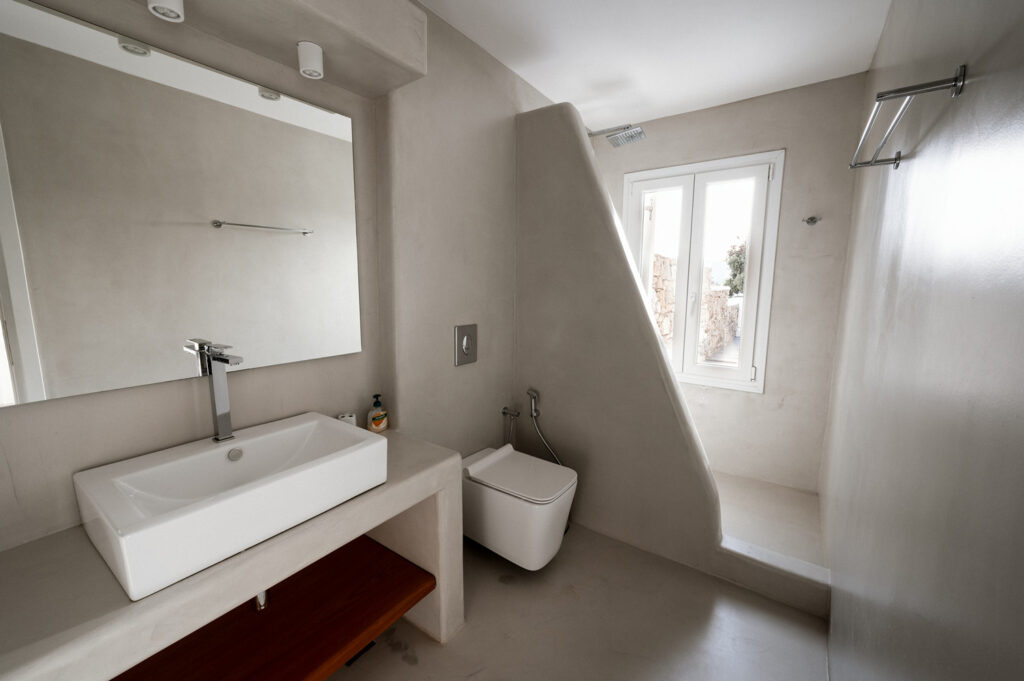 The stylish bathroom within Mykonos vacation home for rent.