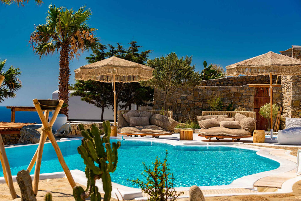 Deluxe pool with cozy sun beds, Mykonos, Greece.