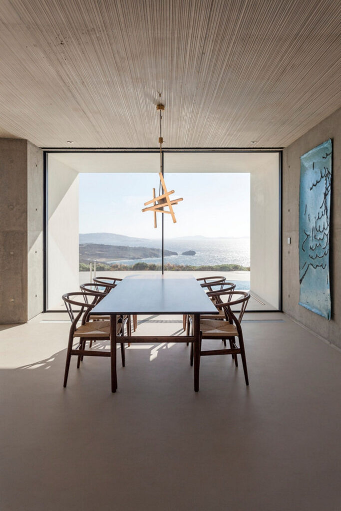 Dining room with a beautiful sea view of the Aegean Sea, Mykonos rental villa.