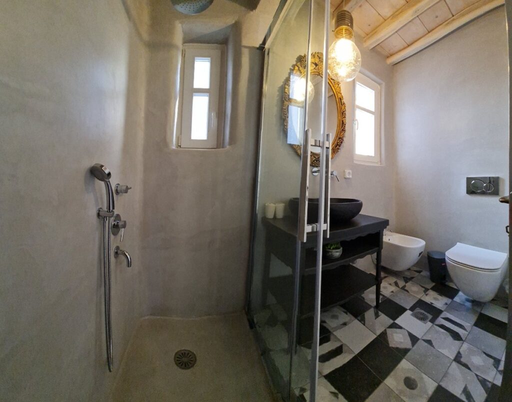 Modern bathroom in Mykonos lavish villa for rent.