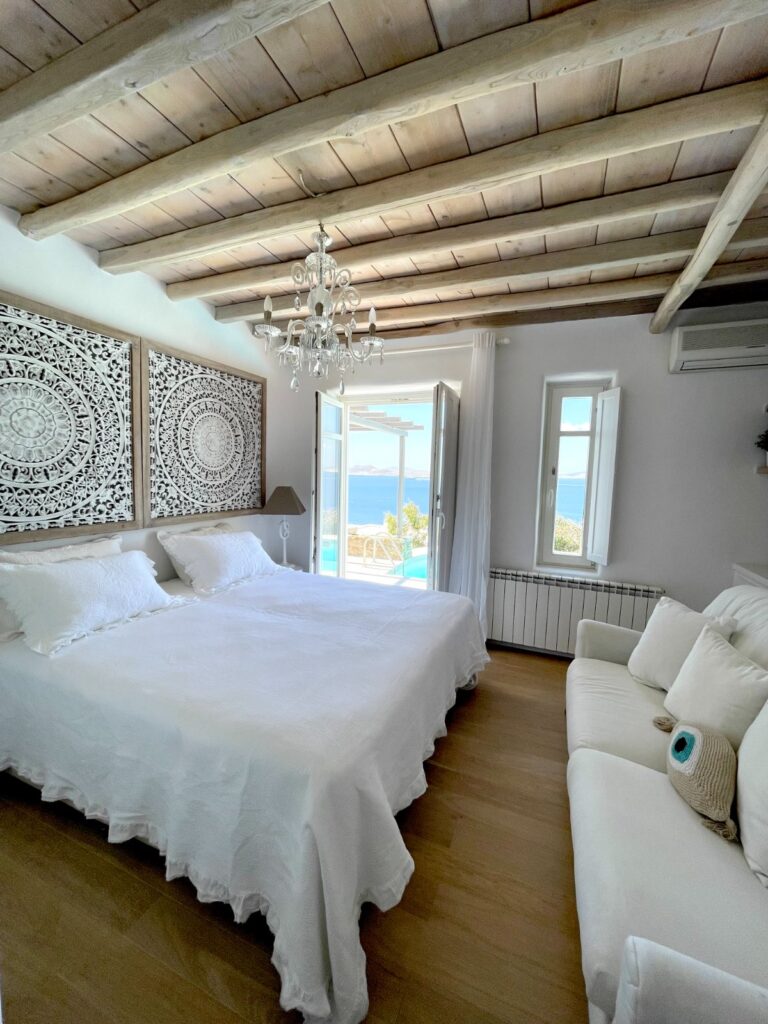 Spacious bedroom full of light in Mykonos secluded villa for rent.
