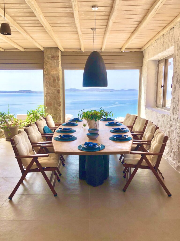 Enjoyable view from elegant dining space in the best villa to stay in, Mykonos, Greece.