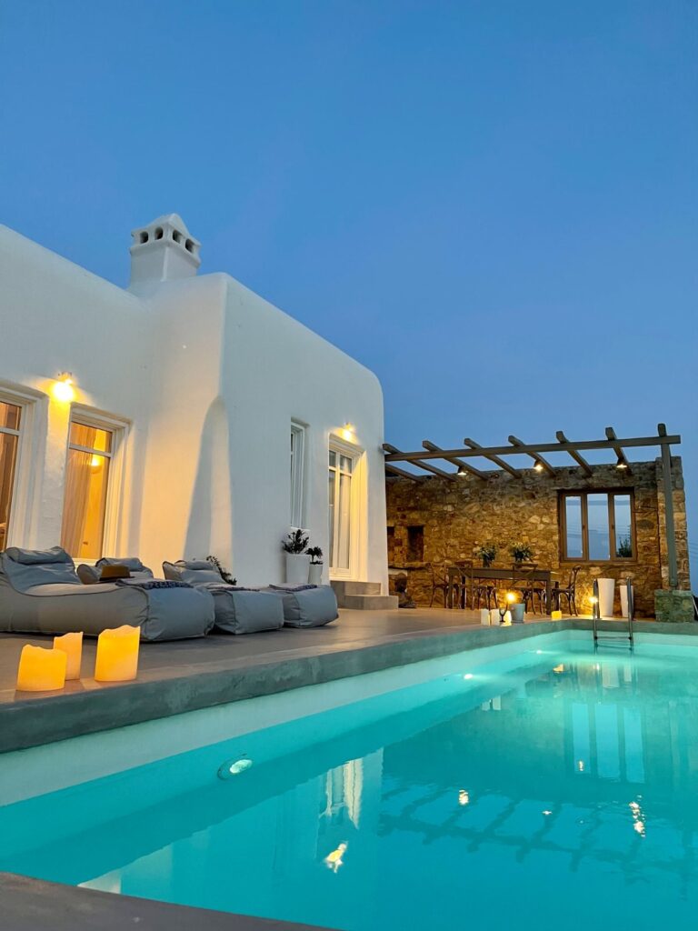 Mykonos' private rental villa with a luxurious swimming pool in a natural Greek environment.