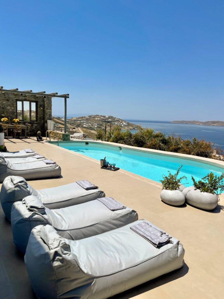Blue waters and chill-out area in the best holiday villa in Mykonos.