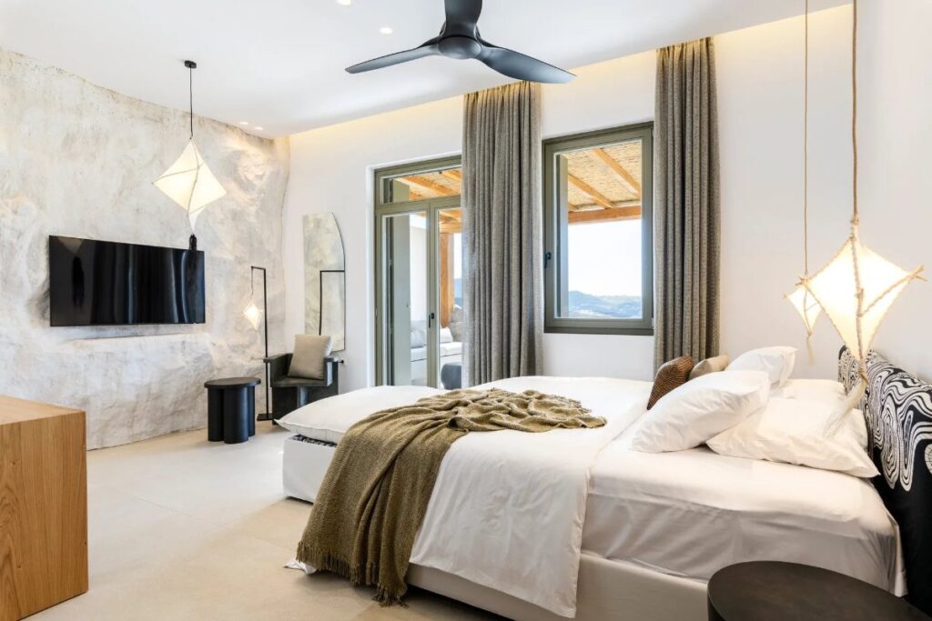 Comfortable bedroom in Mykonos deluxe home for rent.