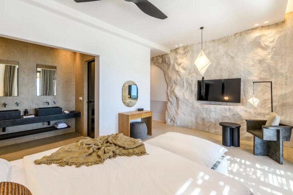 Sophisticated and modern bedroom in a luxurious villa for booking, Mykonos.