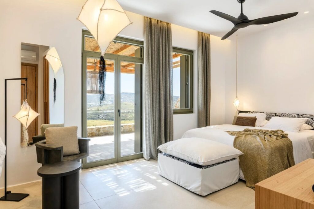 Luxurious bedroom in Mykonos lavish villa for booking.