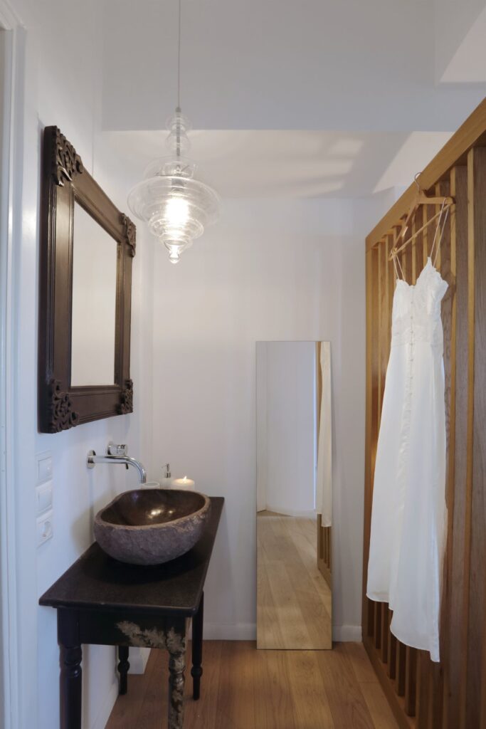 Wooden and white bathroom in Mykonos best villa to stay in.