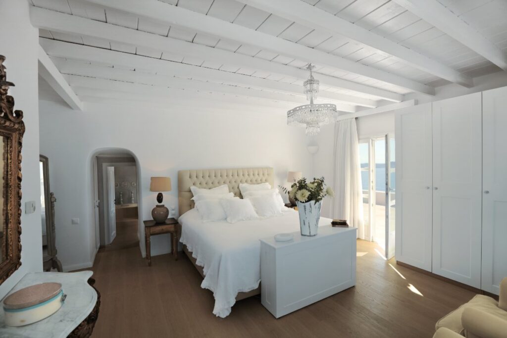 Luxurious bedroom with a large wardrobe in Mykonos best villa for rent.