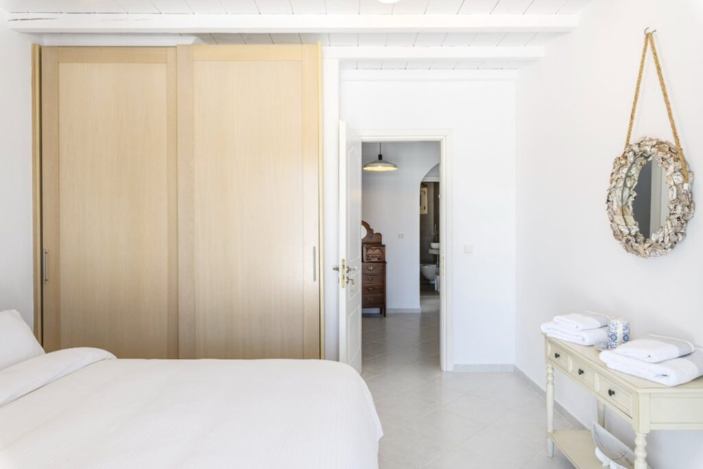 Bedroom with boho details in the best rental villa, Mykonos.
