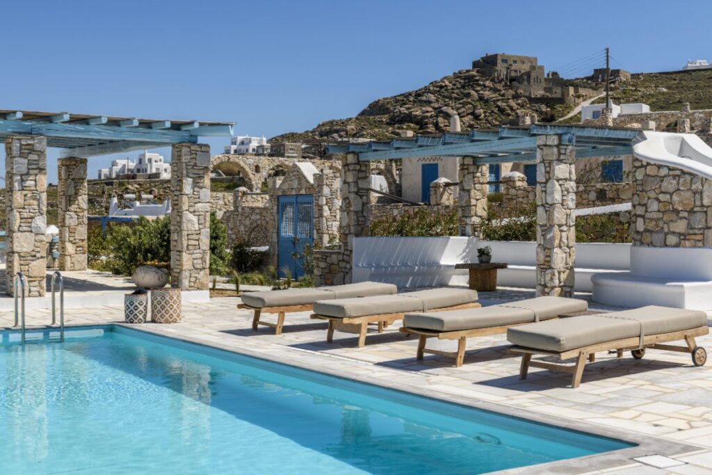 Luxurious swimming pool within a stunning villa available for booking, Mykonos.