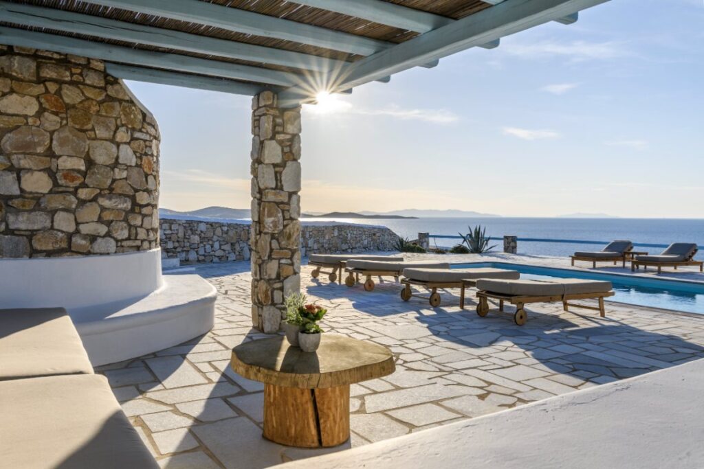 Serene garden in a top-tier villa available for rent, with a stunning sea outlook, Mykonos.