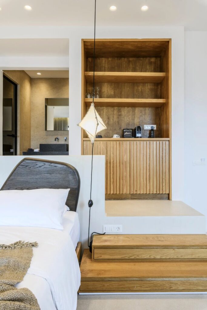 Shelves and cozy atmosphere in a bedroom of Mykonos top rental home.