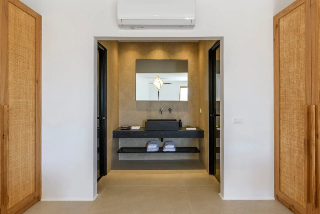 Modern bathroom in Mykonos lavish villa for rent.