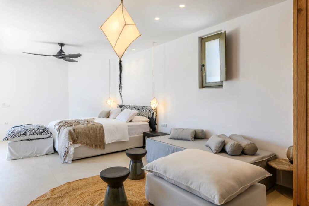 Comfortable bed and fancy details in Mykonos finest villa for rent.