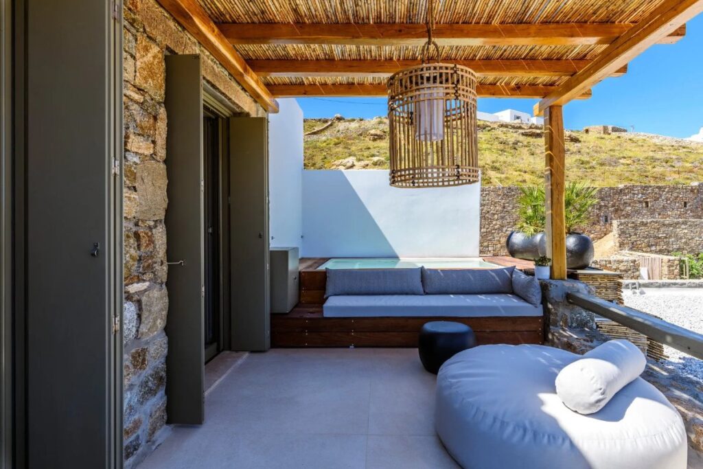 Boho-styled terrace in a luxurious Mykonos villa for rent.
