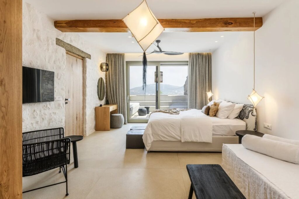 Bedroom full of light in luxurious Mykonos villa for rent.