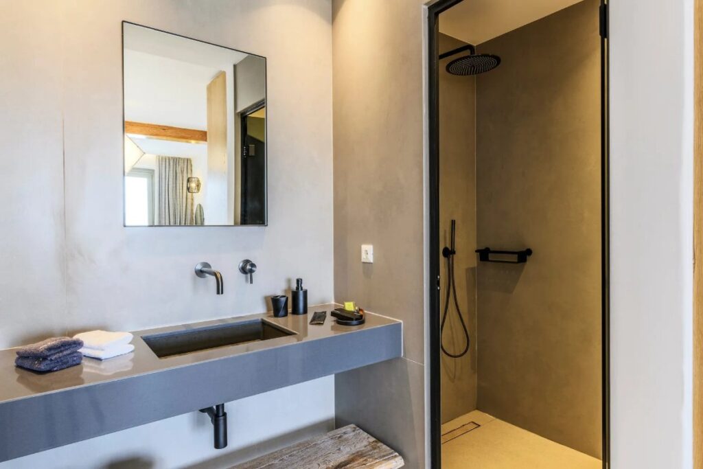 Modern-designed bathroom in Mykonos deluxe villa for rent.