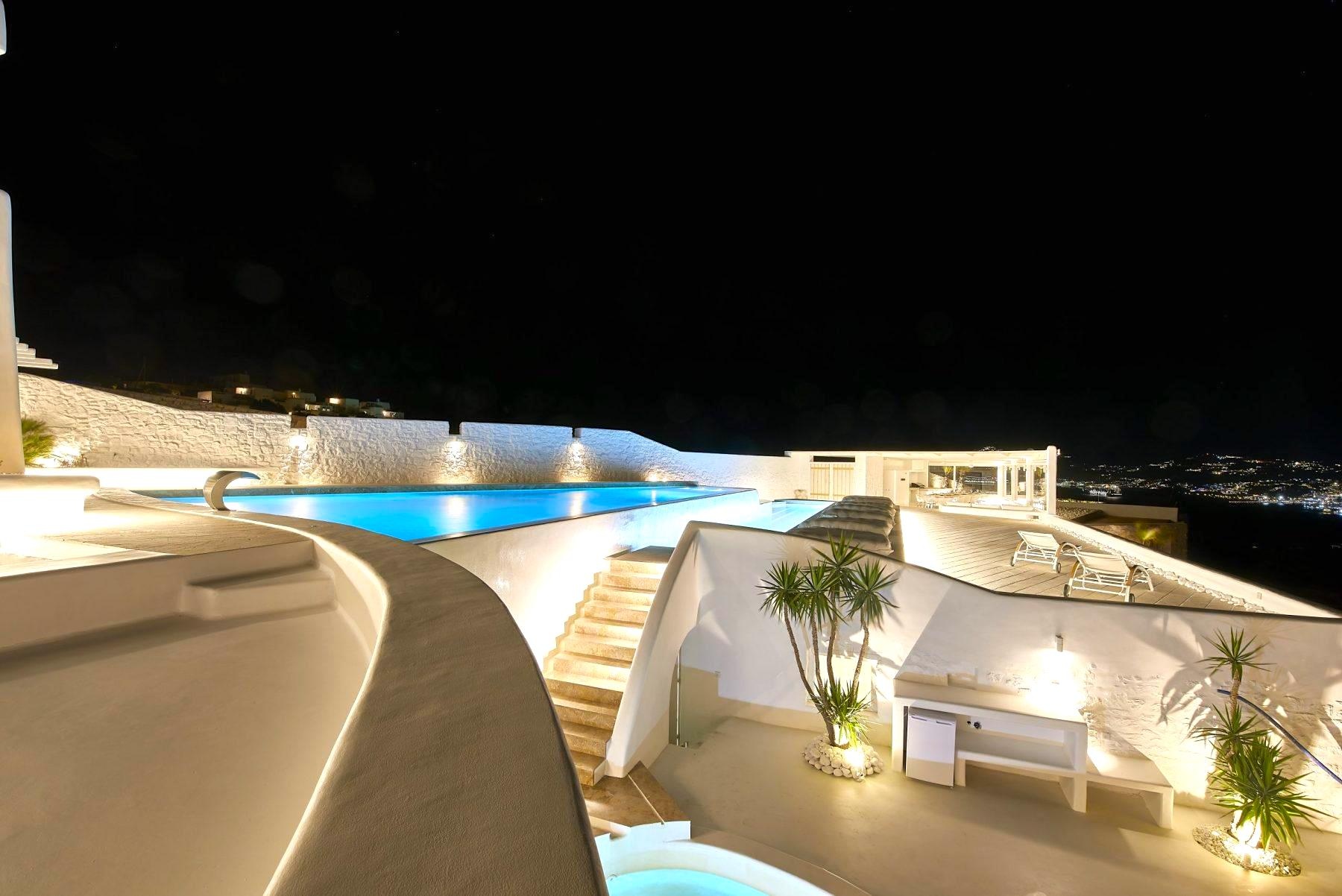 View of a luxury Mykonos villa rental at night