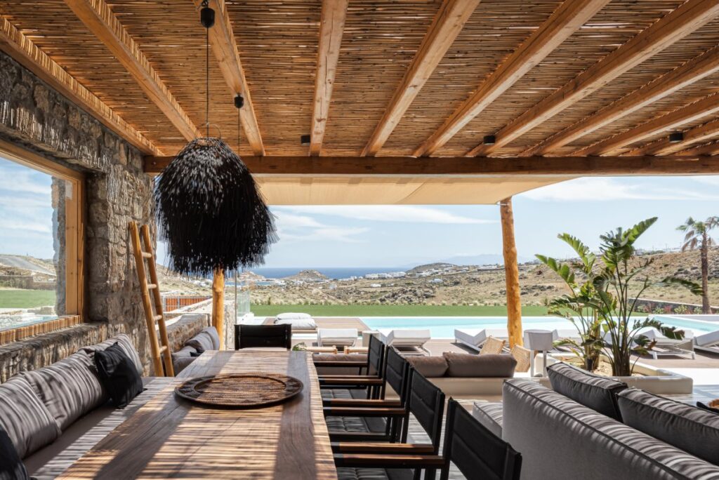 Embrace the Aegean sea view and enjoy the outdoor chill-out area in the luxurious Mykonos rental villa.