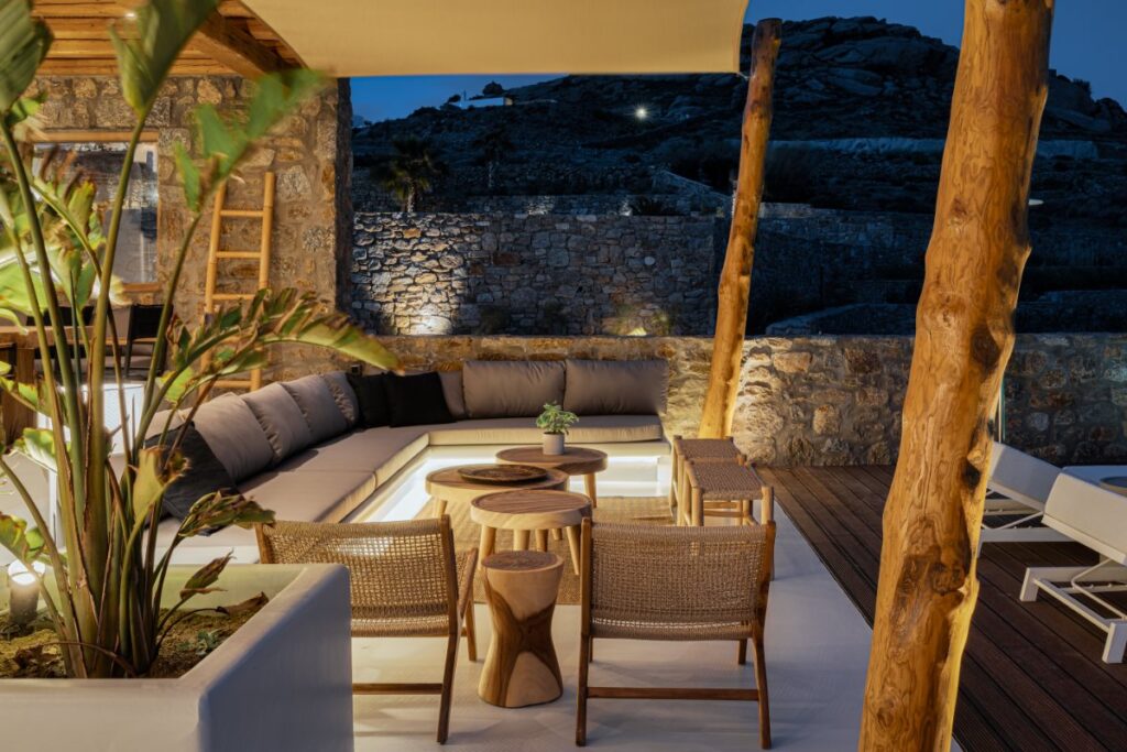Outdoor furniture and cozy corner in a top rental villa, Mykonos.