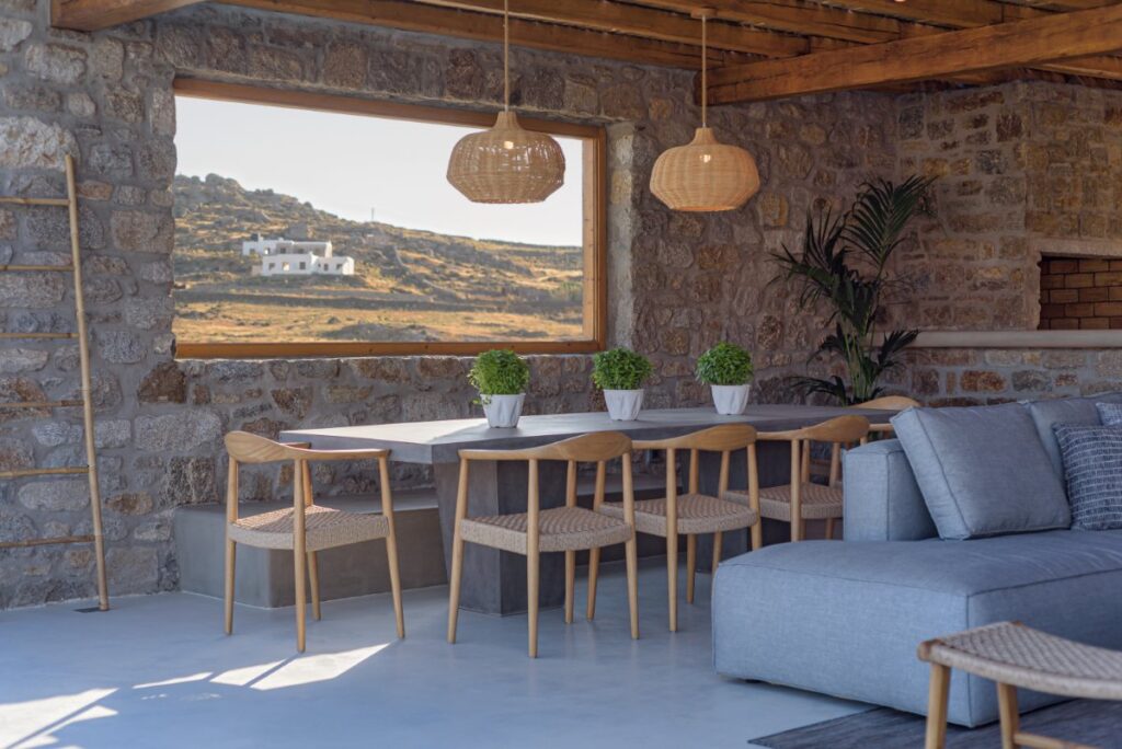 Have dinner outside of Mykonos' best villa for rent.