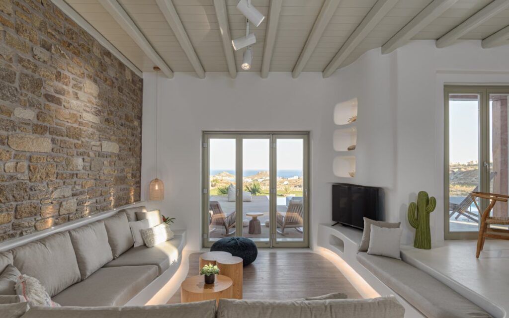 The lavishly furnished living room of an exquisite Mykonos rental villa.