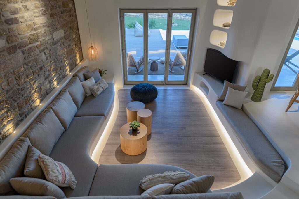 The stunning living room of a luxurious Mykonos rental villa.