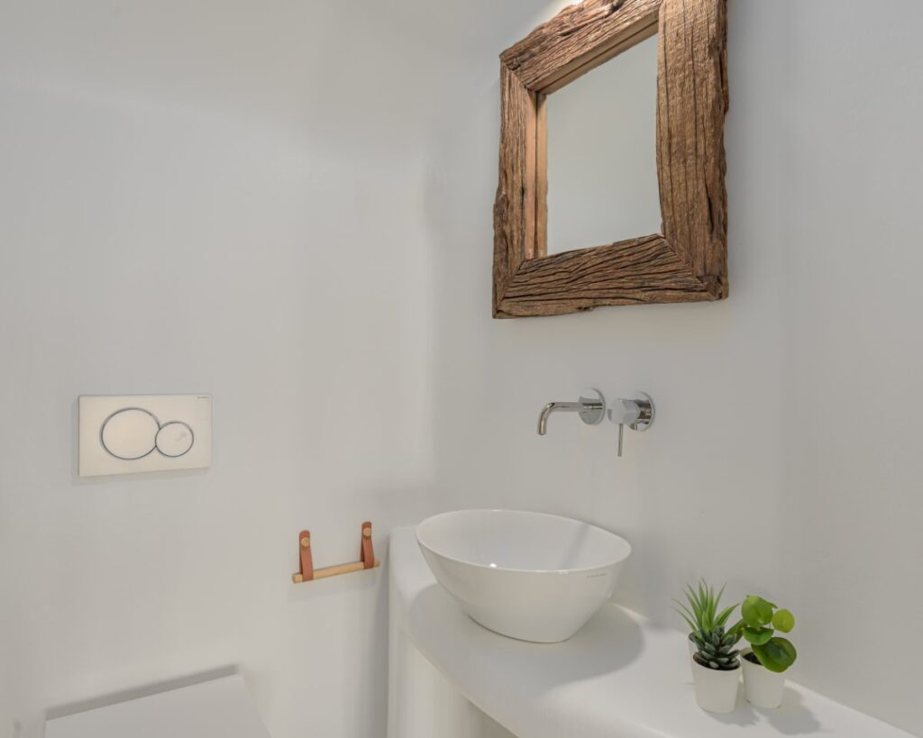 Modern and full of light bathroom in Mykonos best villa for rent.