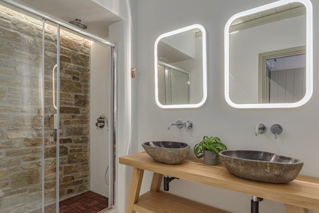Lavish bathroom with wonderful light and mirrors, Mykonos villa for rent.
