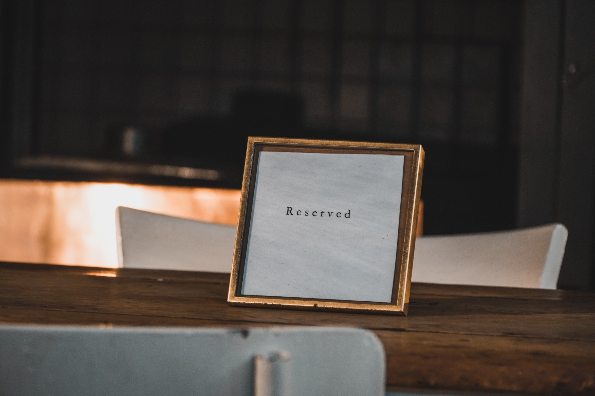 A reserved sign on a table 