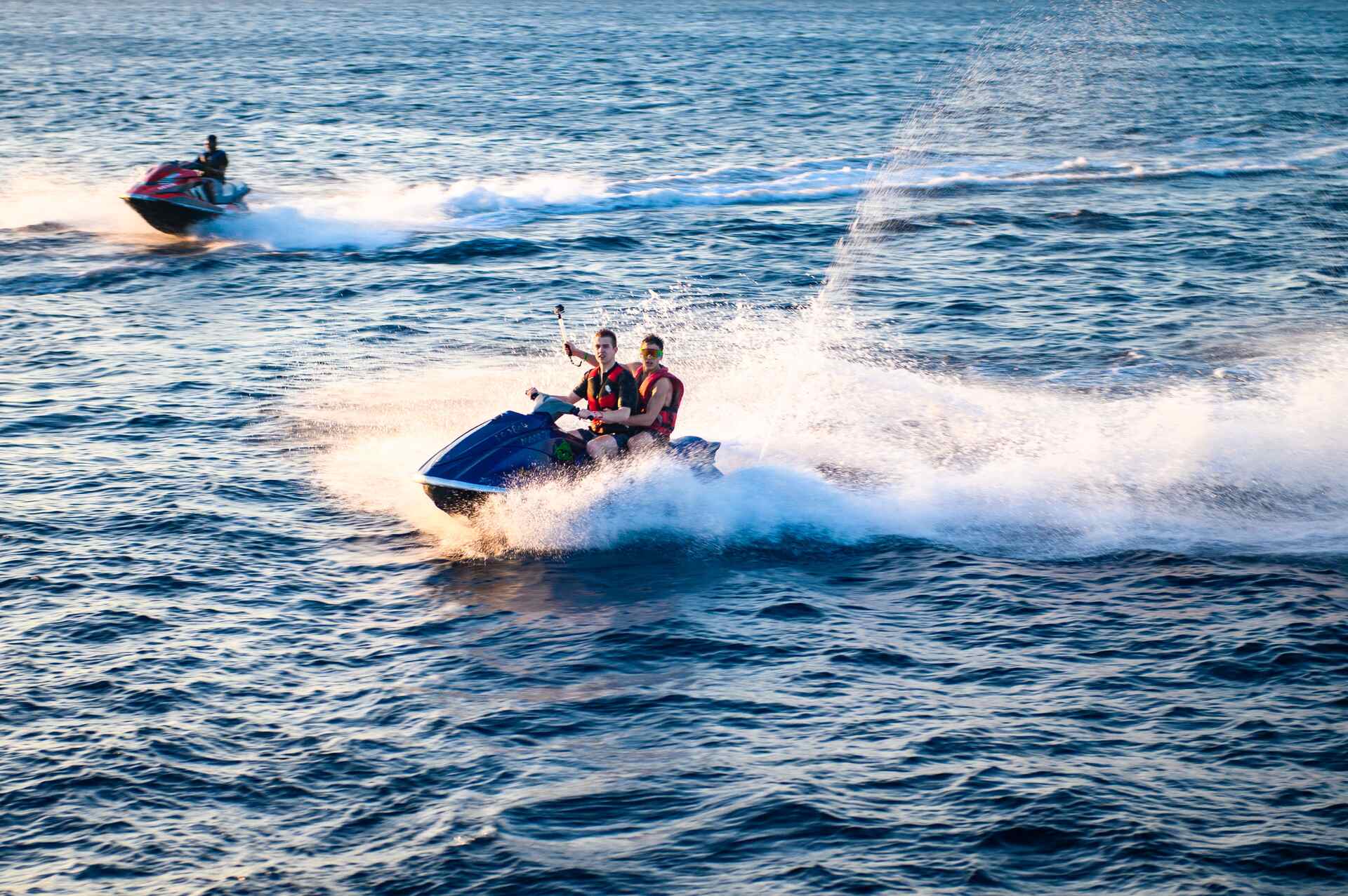 People riding on a jet ski