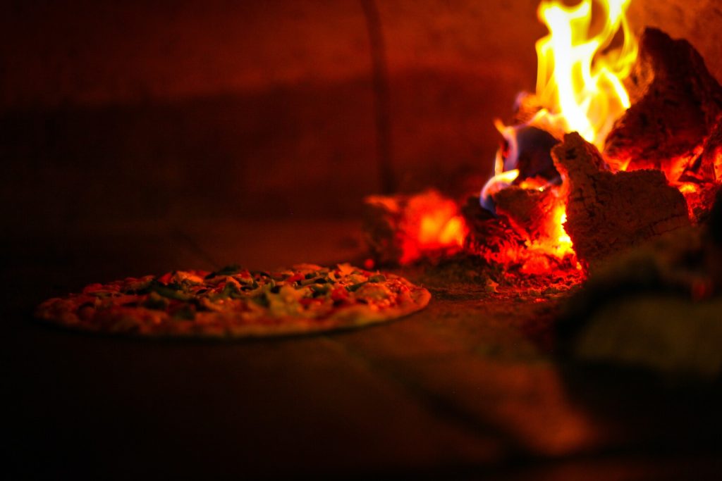 Pizza being baked in the oven