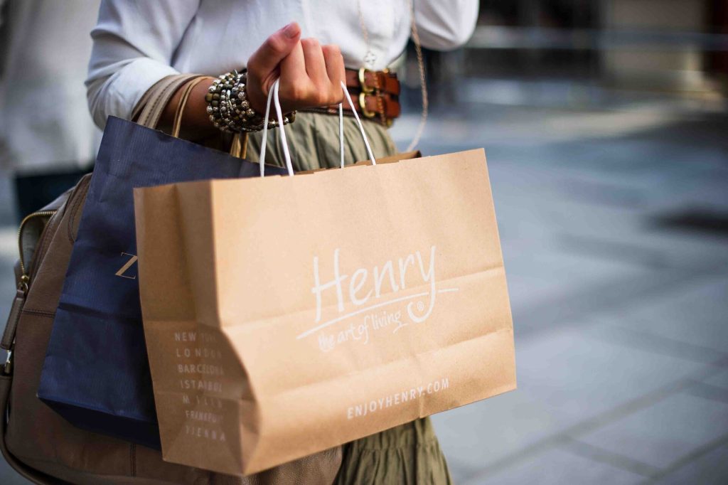 Woman holding several shopping bags