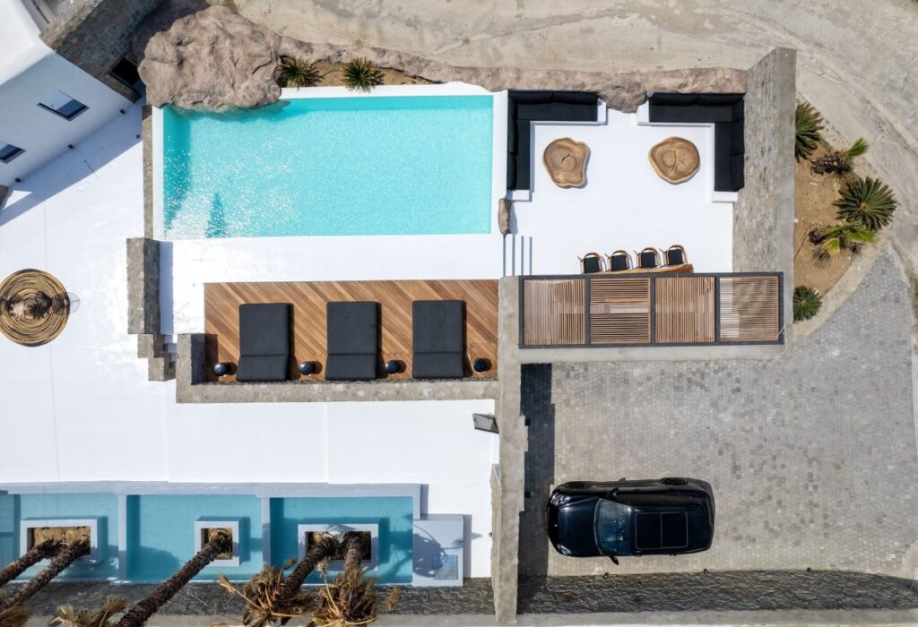 Mykonos villa with a spacious yard and pool, ready for rent.