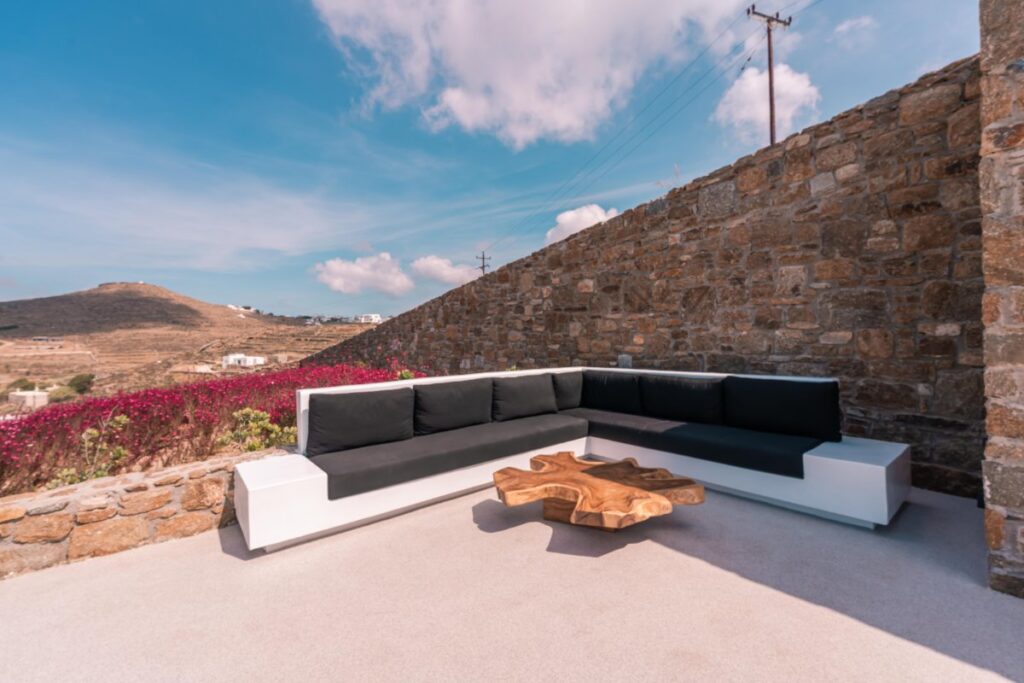 Comfy sofa outside of the most lavish villa for rent, Mykonos.