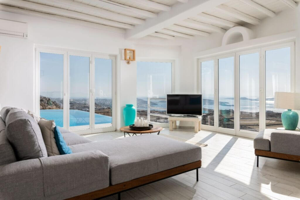 Breathtaking sea view from the lavish living room in Mykonos villa for rent.