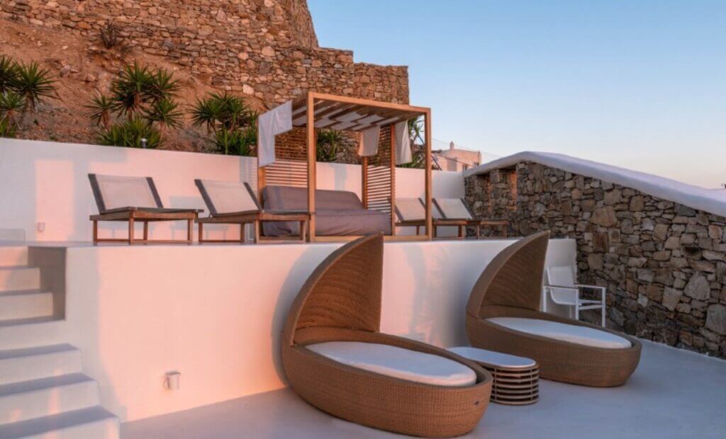 Cozy sun beds in the finest villa for rent, Mykonos.