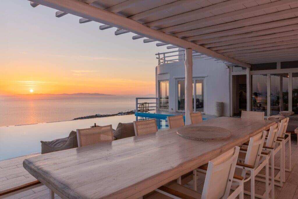 Watch the sunset from the opulent terrace in Mykonos villa for rent.