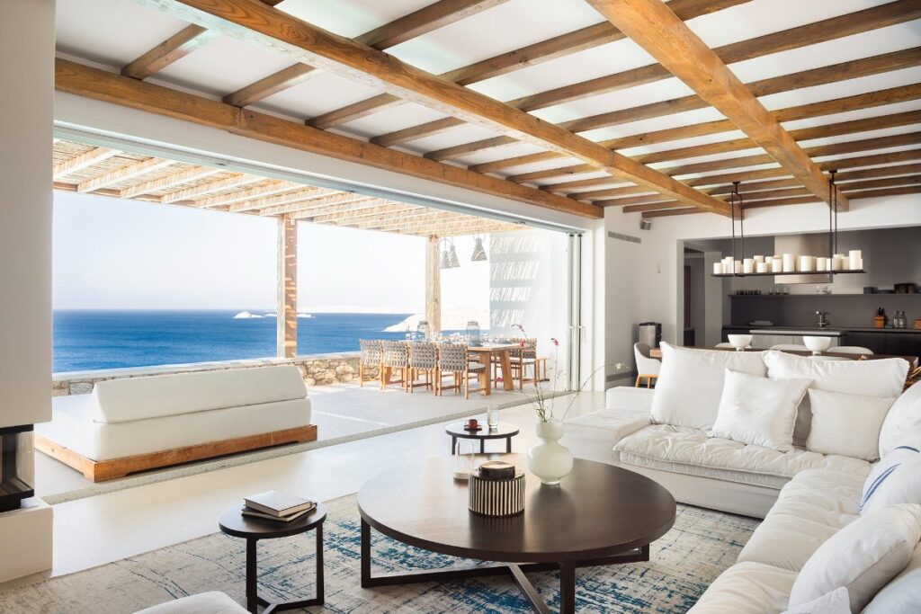 Rent a Mykonos luxurious villa with a bright living room and the Aegean Sea view.