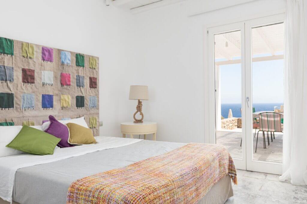 Enjoy the cozy bedroom in Mykonos, Greece.