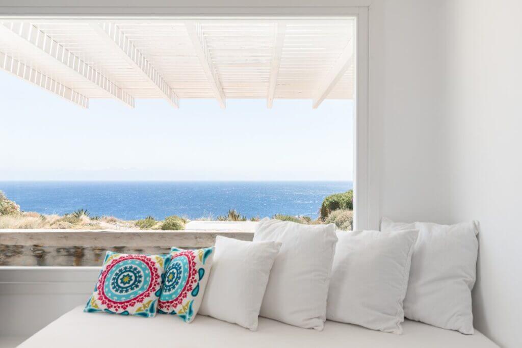 Cozy corner and the fantastic view of the seaside from Mykonos rental villa.