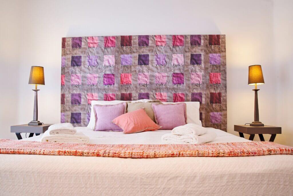 Colorful and comfy bedroom in the top villa for booking, Mykonos.
