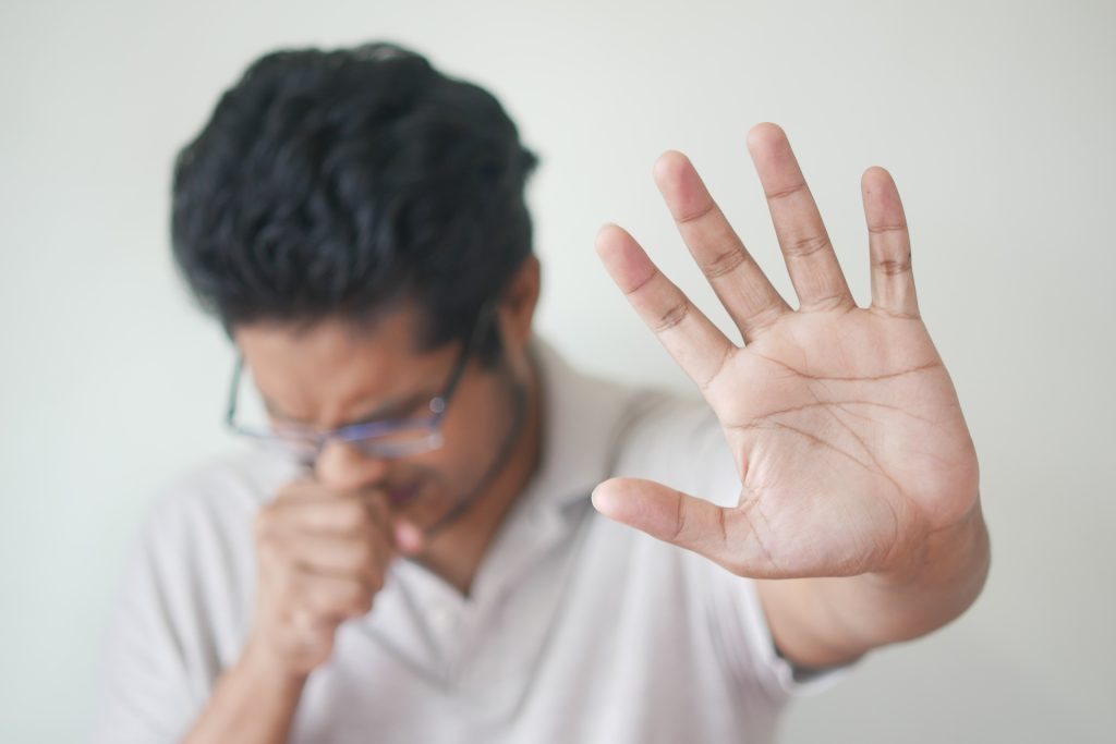 A man sneezing